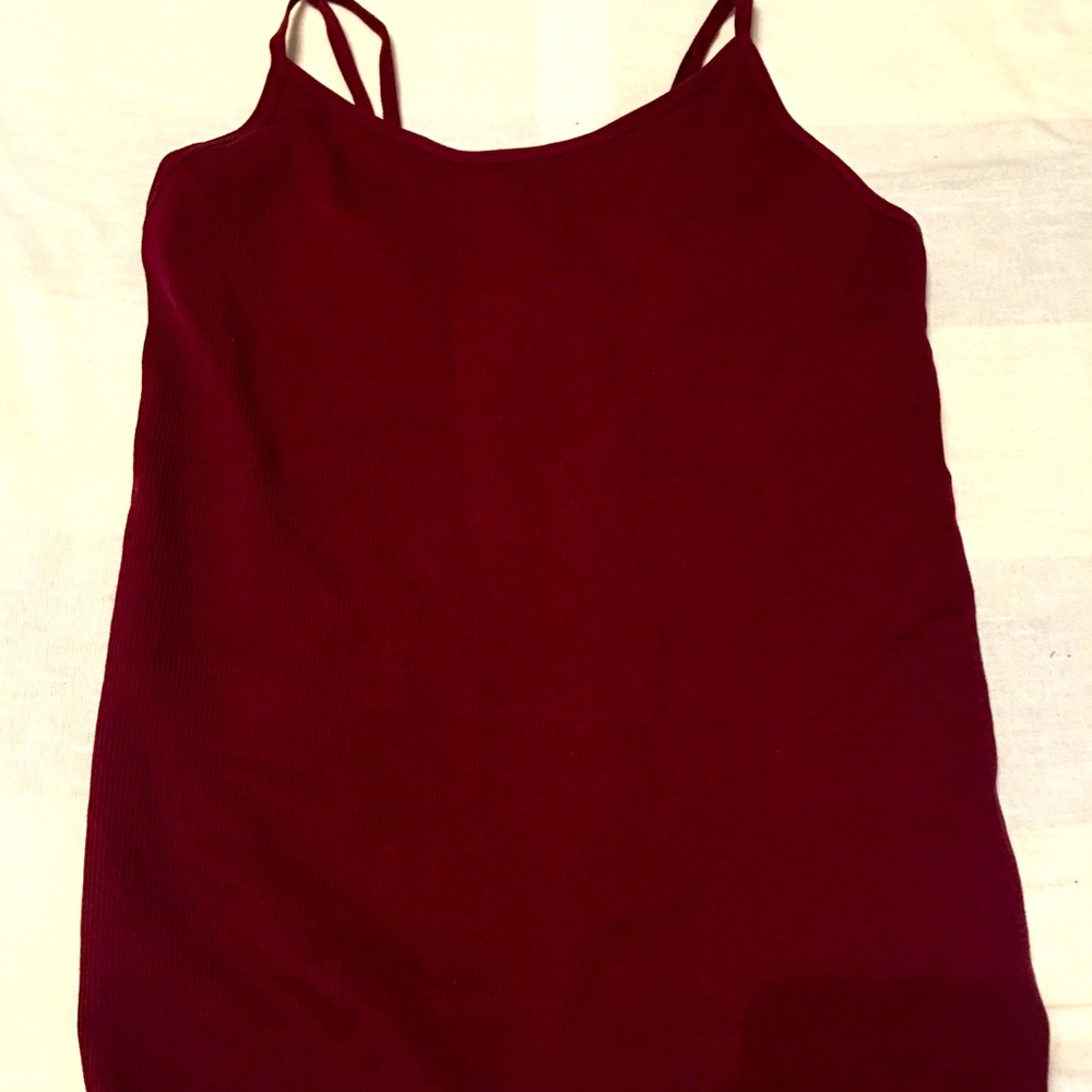 Maroon tank top. No rips no stains.